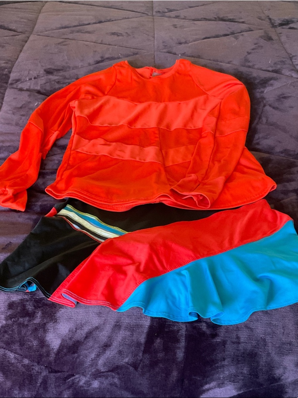 Bright orange Long-Sleeve Top with Colorblock Skirt. Lucky in love
